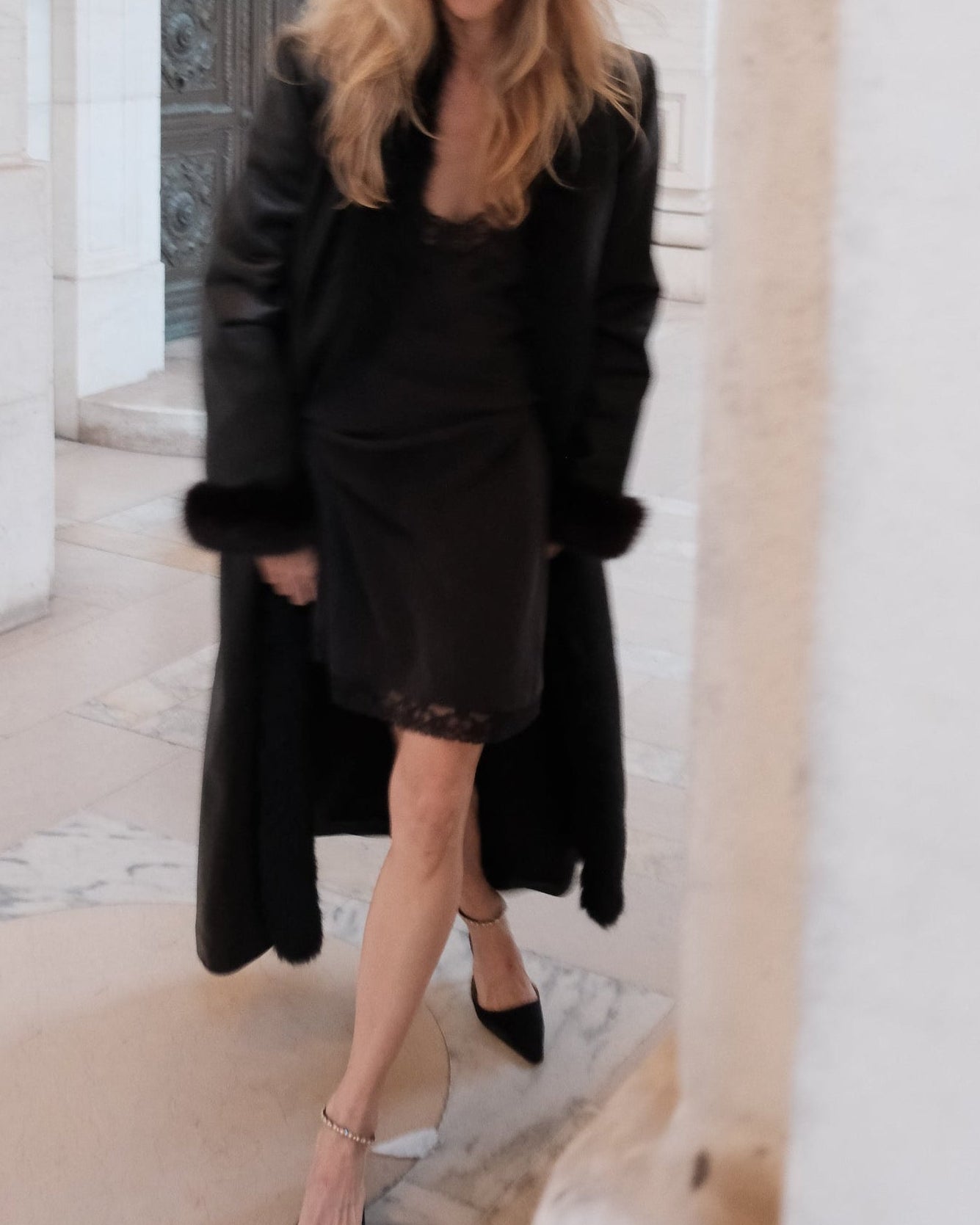 Early 90s black leather and real mink trench coat, full length back view — BB Vintage by Maxine