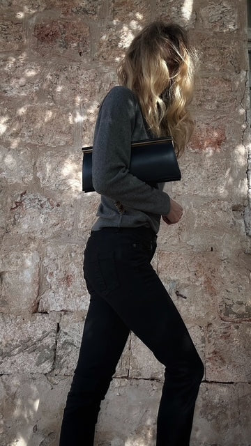 Navy leather rigid frame clutch, gold bar closure, minimal silhouette — BB Vintage by Maxine