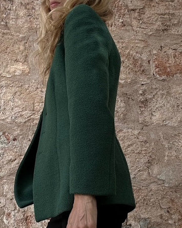 Giorgio Armani 90s blazer side detail, forest green fabric texture,